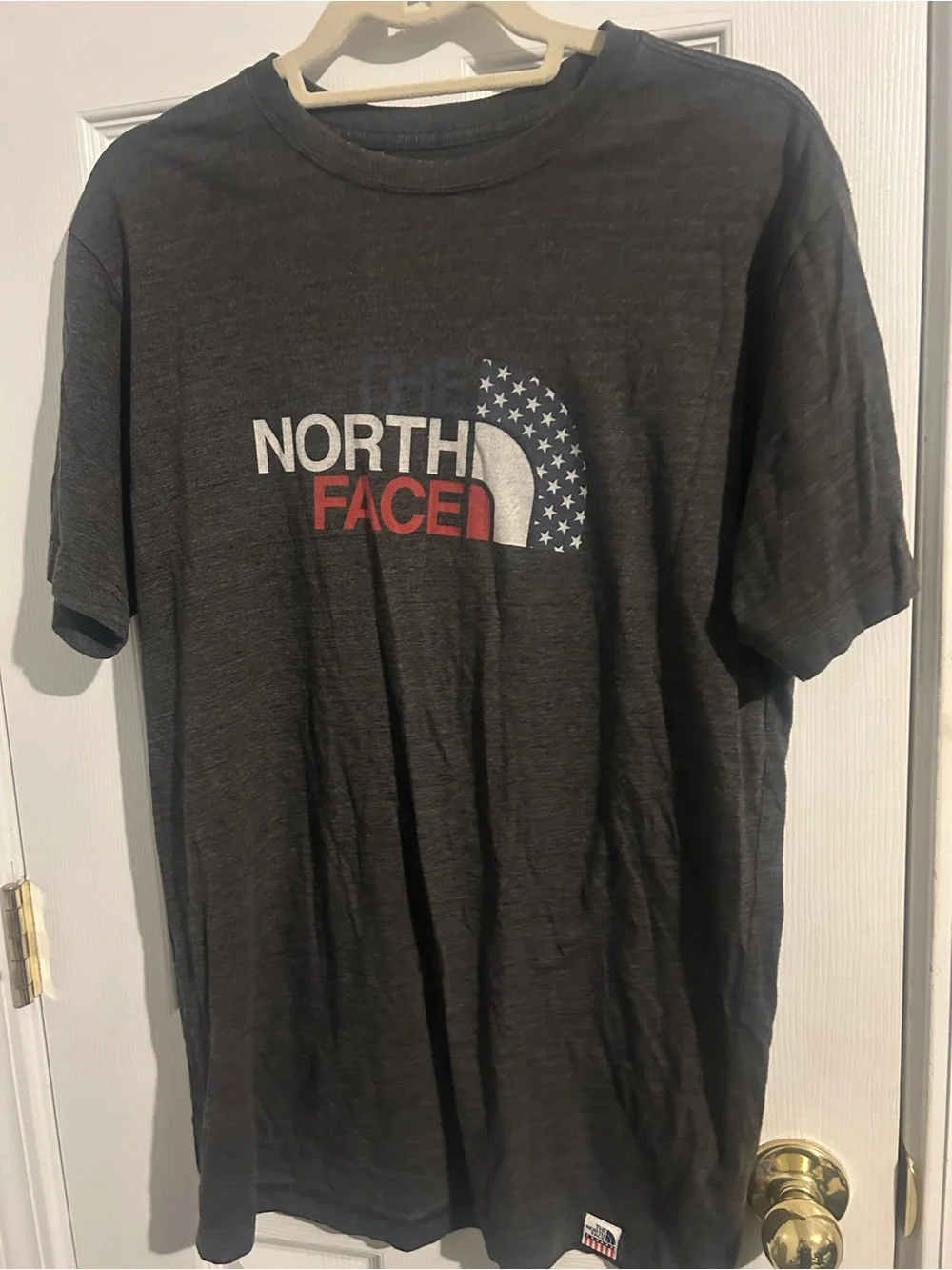 The North Face Men's Black Short Sleeve Logo Tee with Red & White Accents